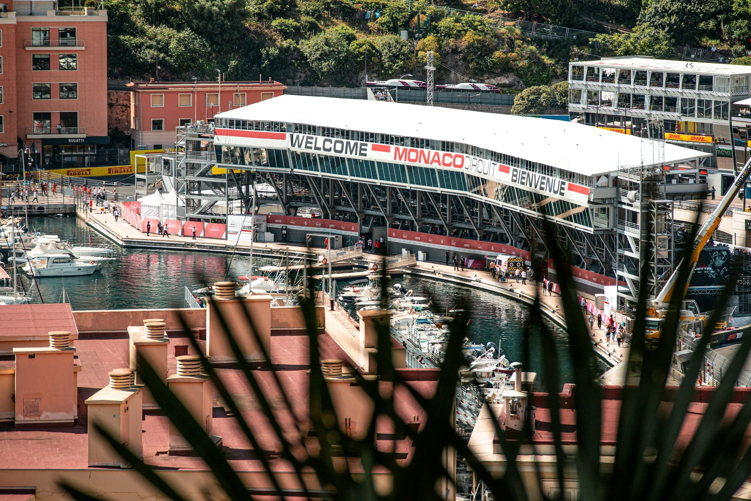 Mediterranean coast at golden hour — race weekend above the harbour